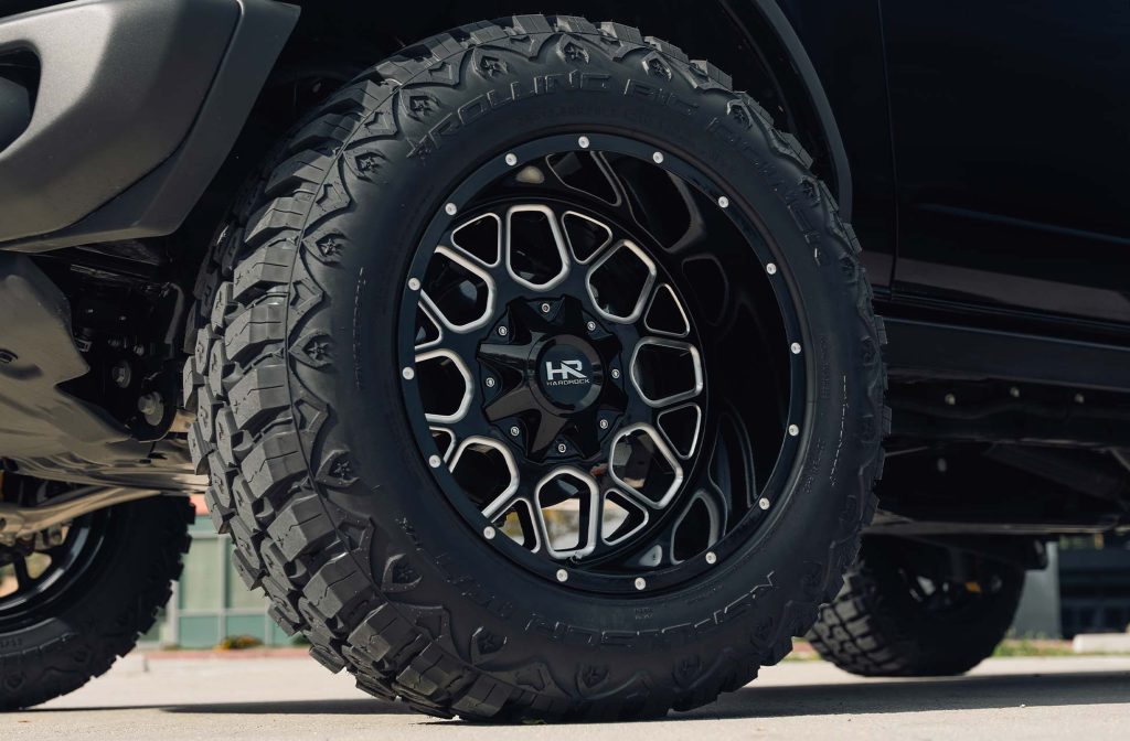 Image of a Ford Bronco with Gloss Black Milled H705 Hardrock Offroad wheels in 20x12
