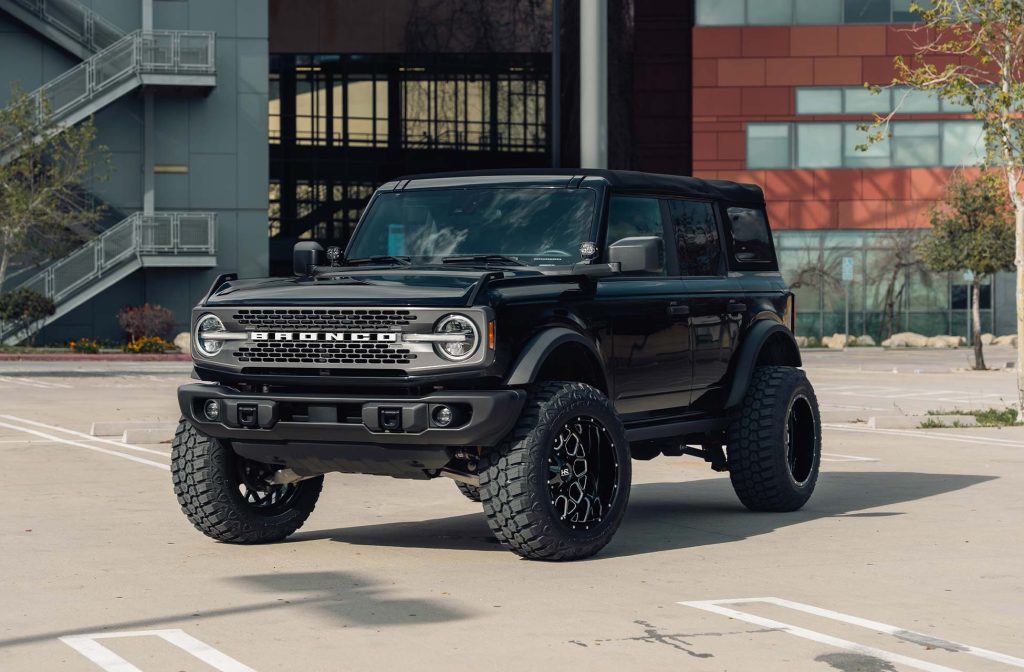 Image of a Ford Bronco with Gloss Black Milled H705 Hardrock Offroad wheels in 20x12