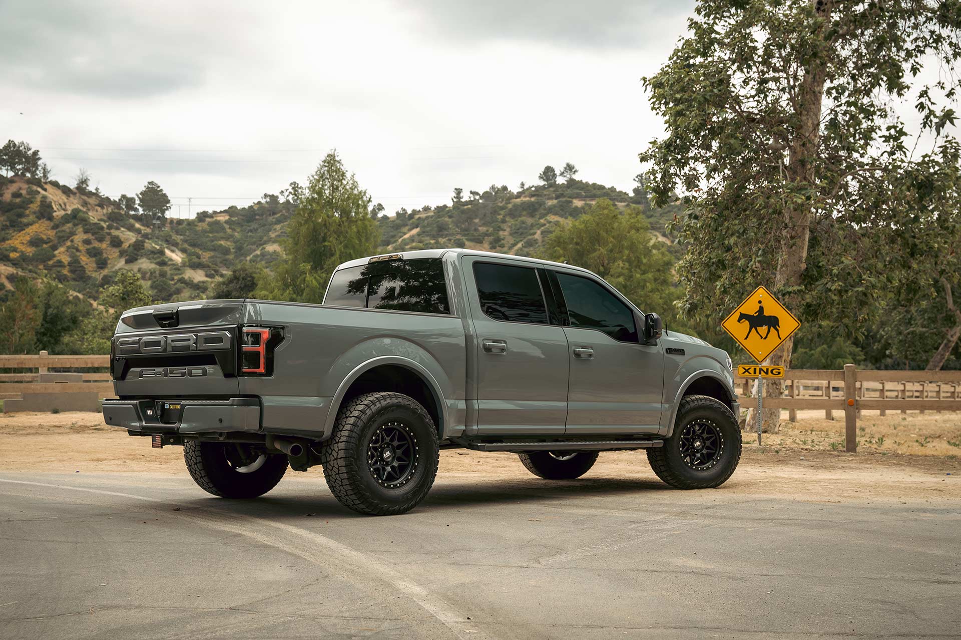 abyss gray ford f-150 with matte black hardrock h105 off road wheels