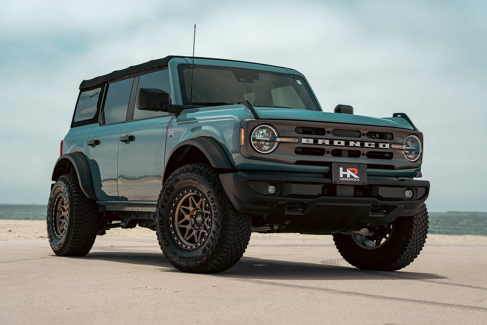 area 51 blue ford bronco with matte bronze hardrock h105 off road wheels