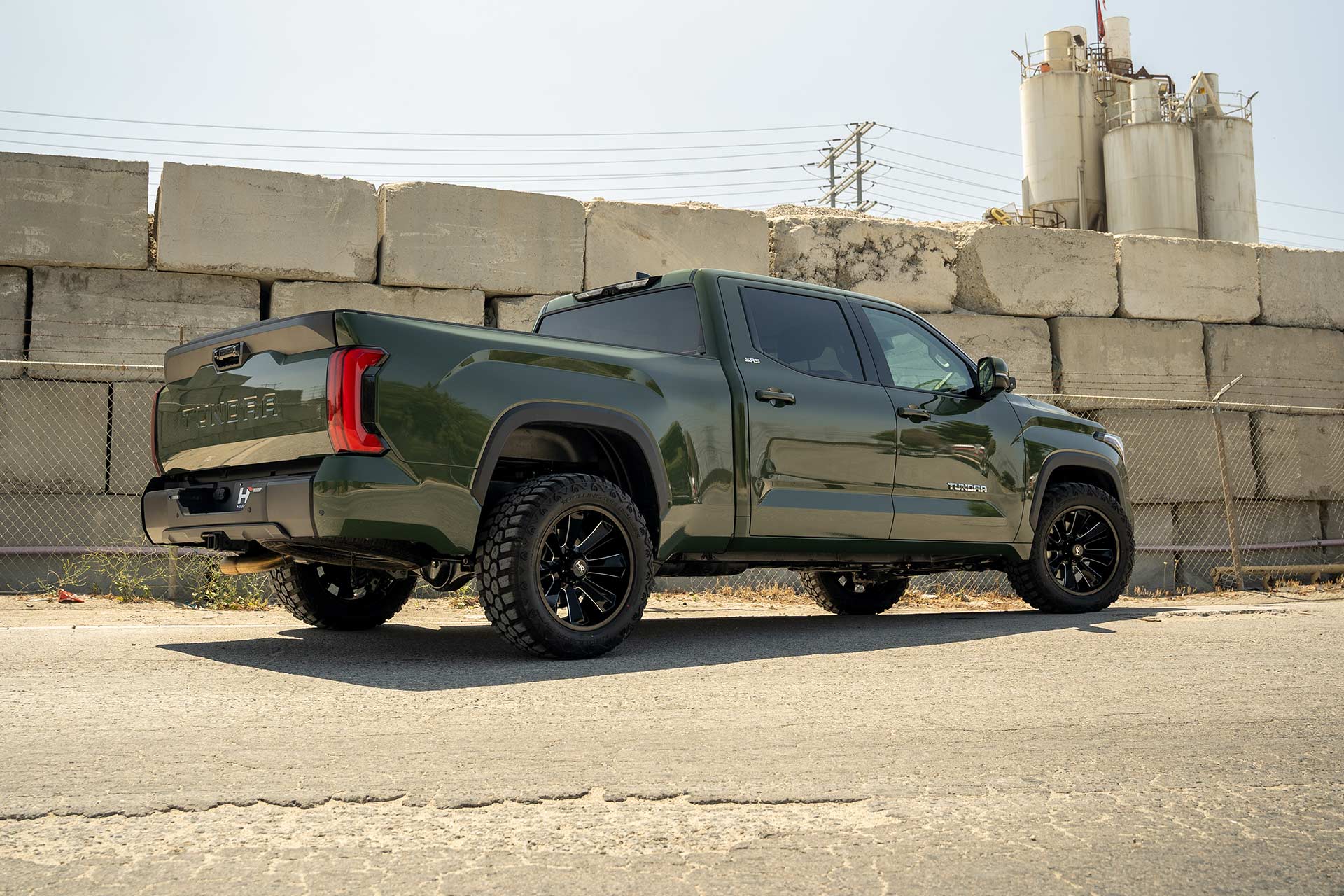 army green toyota tundra with gloss black milled h506 off road wheels