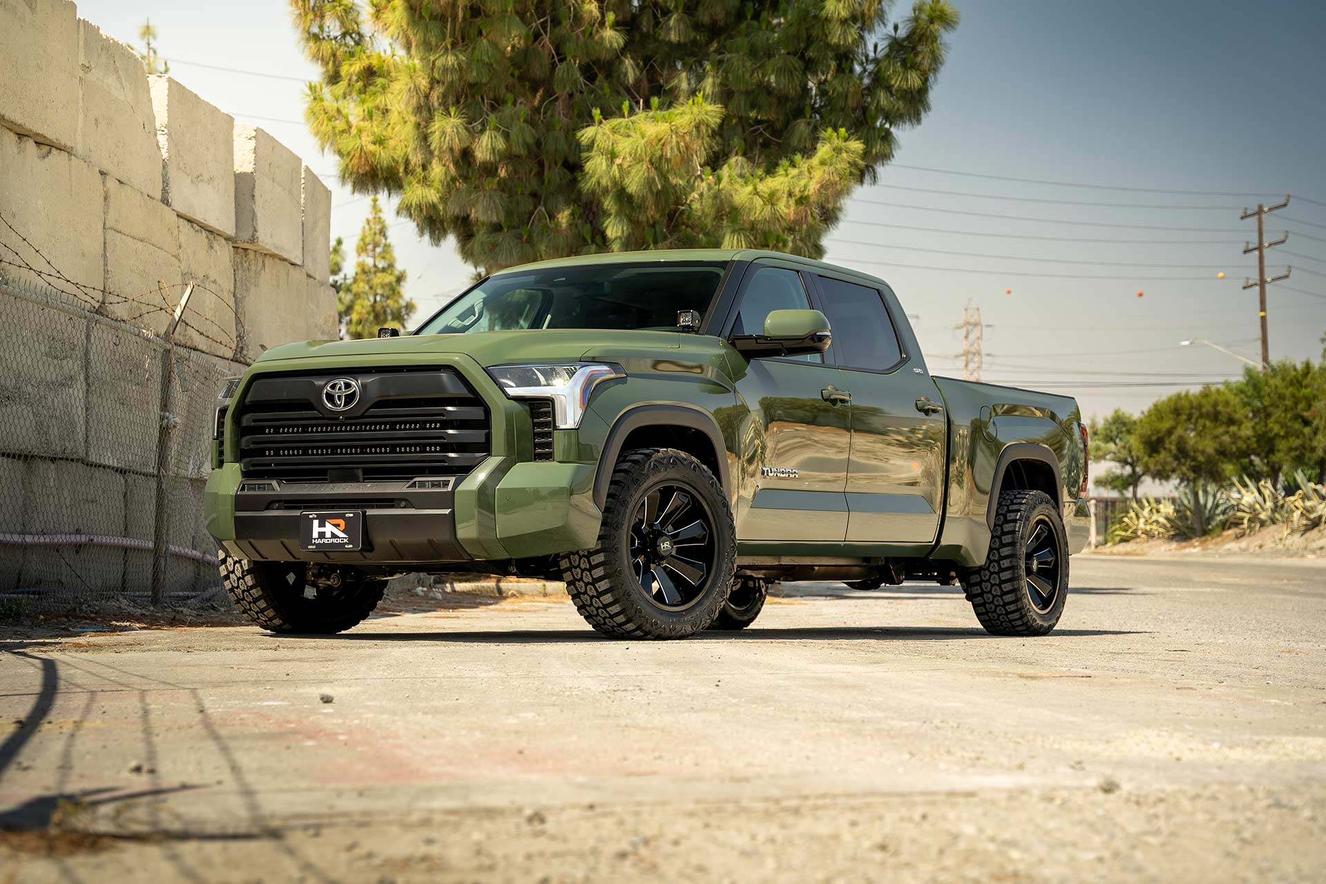 army green toyota tundra with gloss black milled h506 off road wheels