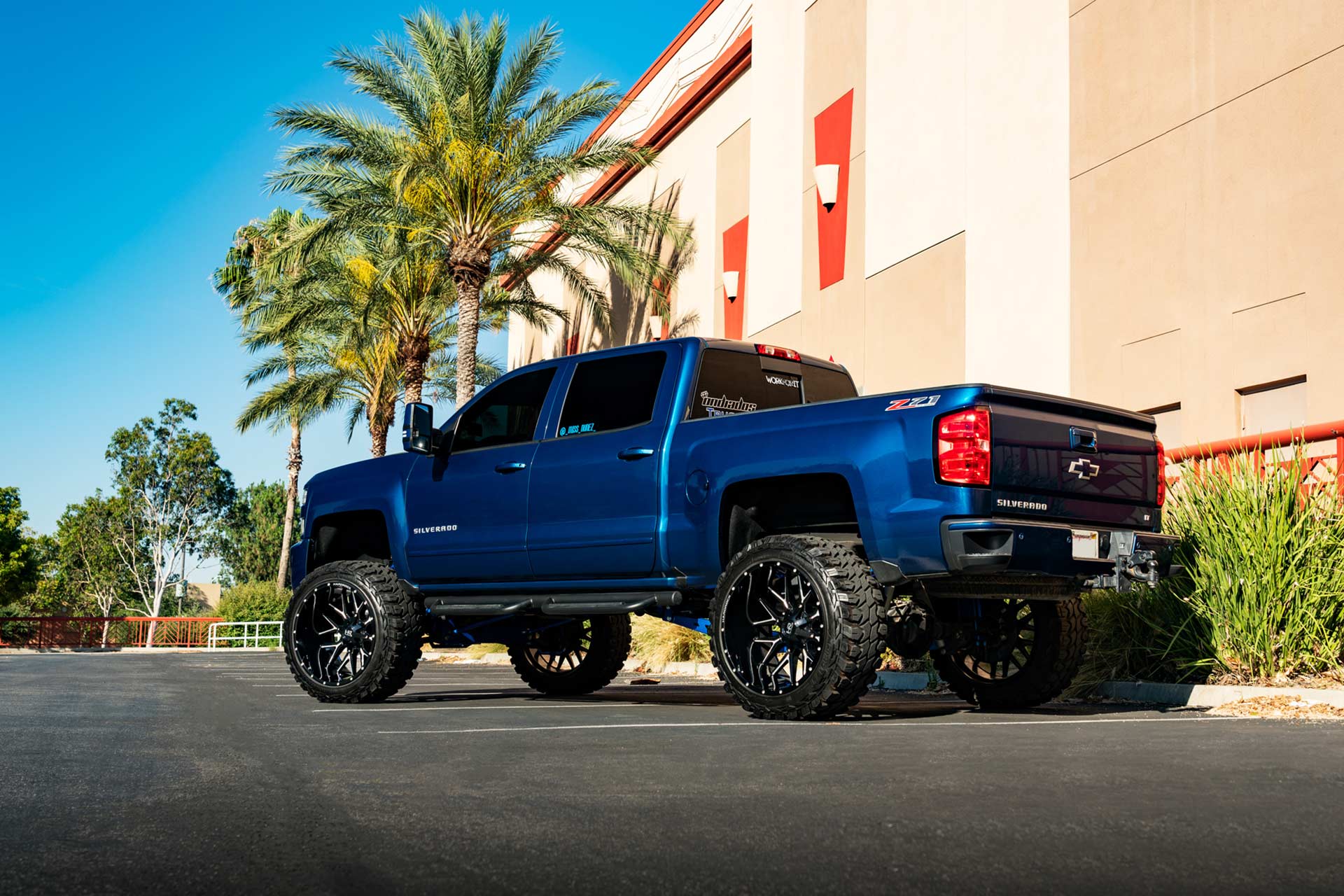 blue chevy silverado 1500 z71 with gloss black milled hardrock h700 truck wheels