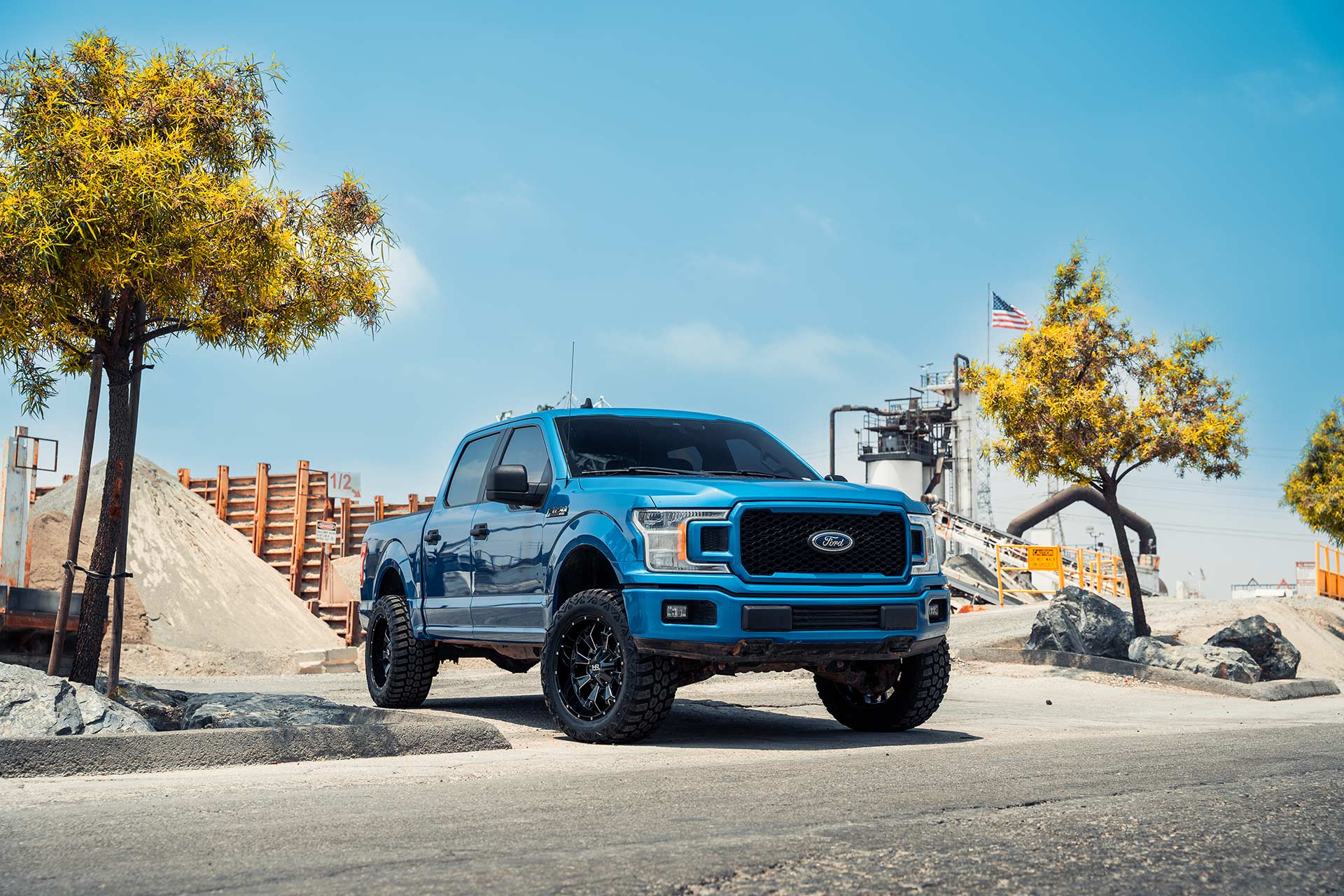 blue ford f-150 with gloss black milled h711 truck wheels