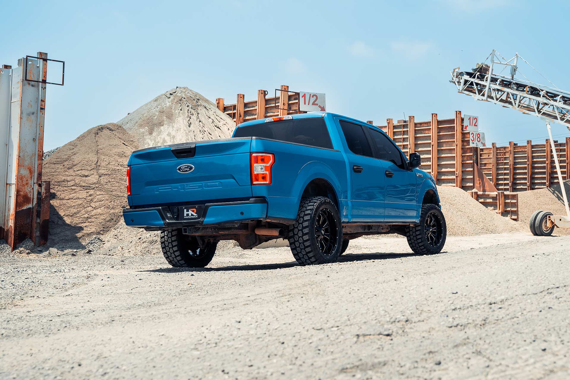 blue ford f-150 with gloss black milled h711 truck wheels