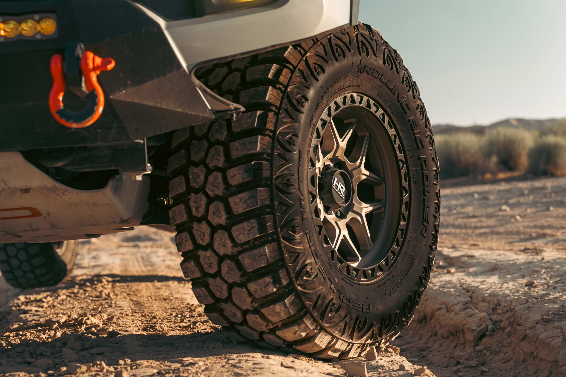 cement gray toyota tacoma with matte bronze hardrock h107 off road wheels