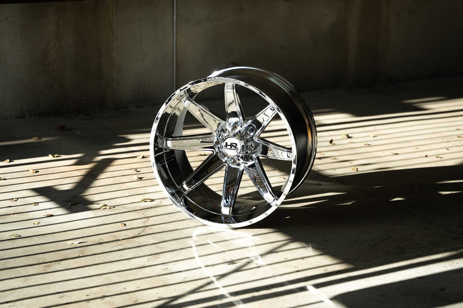 polished chrome hardrock offroad h502 in garage covered in shadows