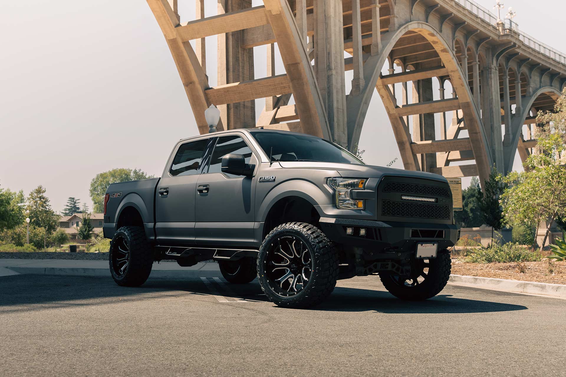 matte gray ford f-150 with gloss black milled hardrock h505 truck wheels