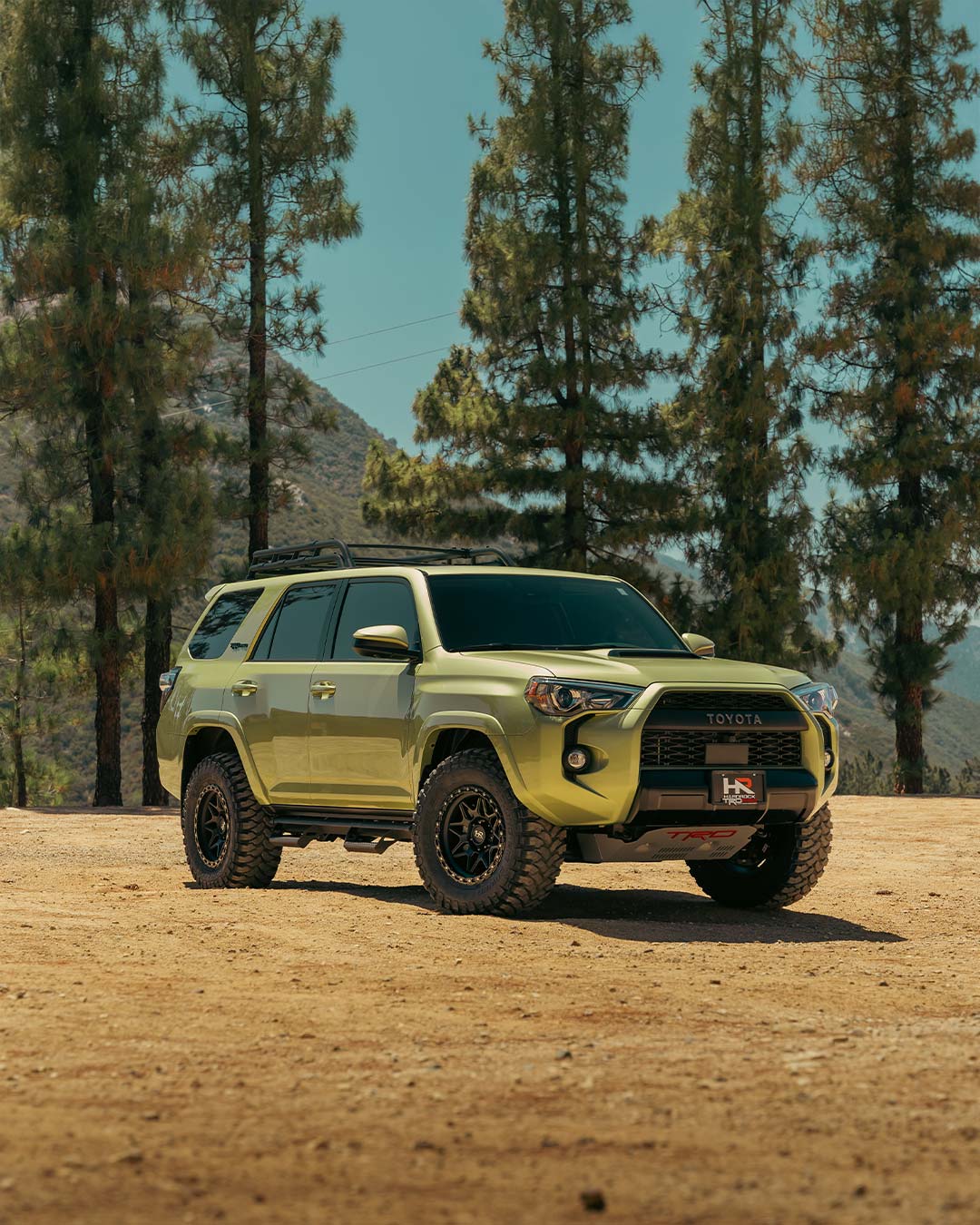 lime rush green toyota 4runner on trail