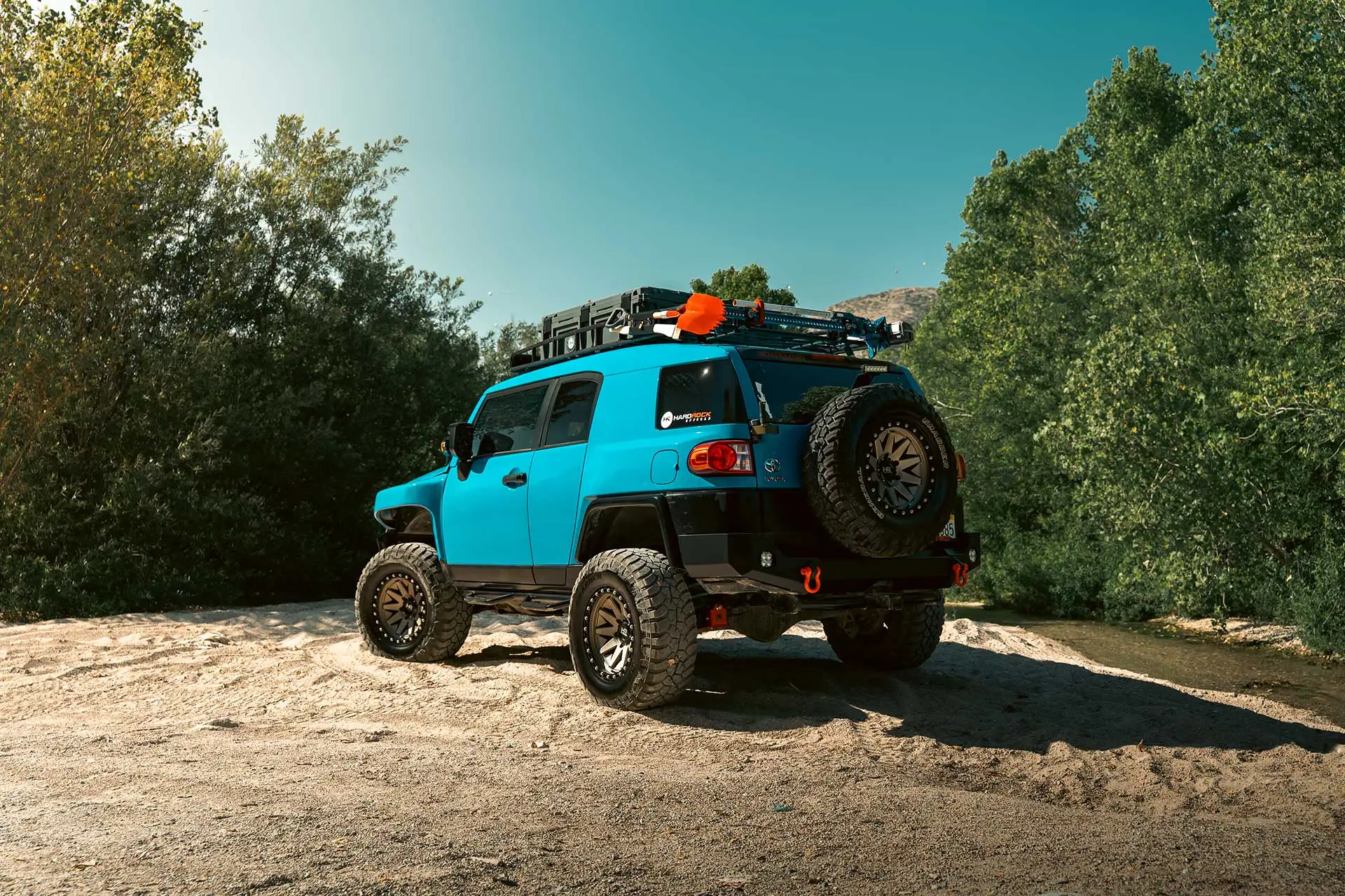 voodoo blue toyota fj cruiser with matte bronze h106 off road wheels