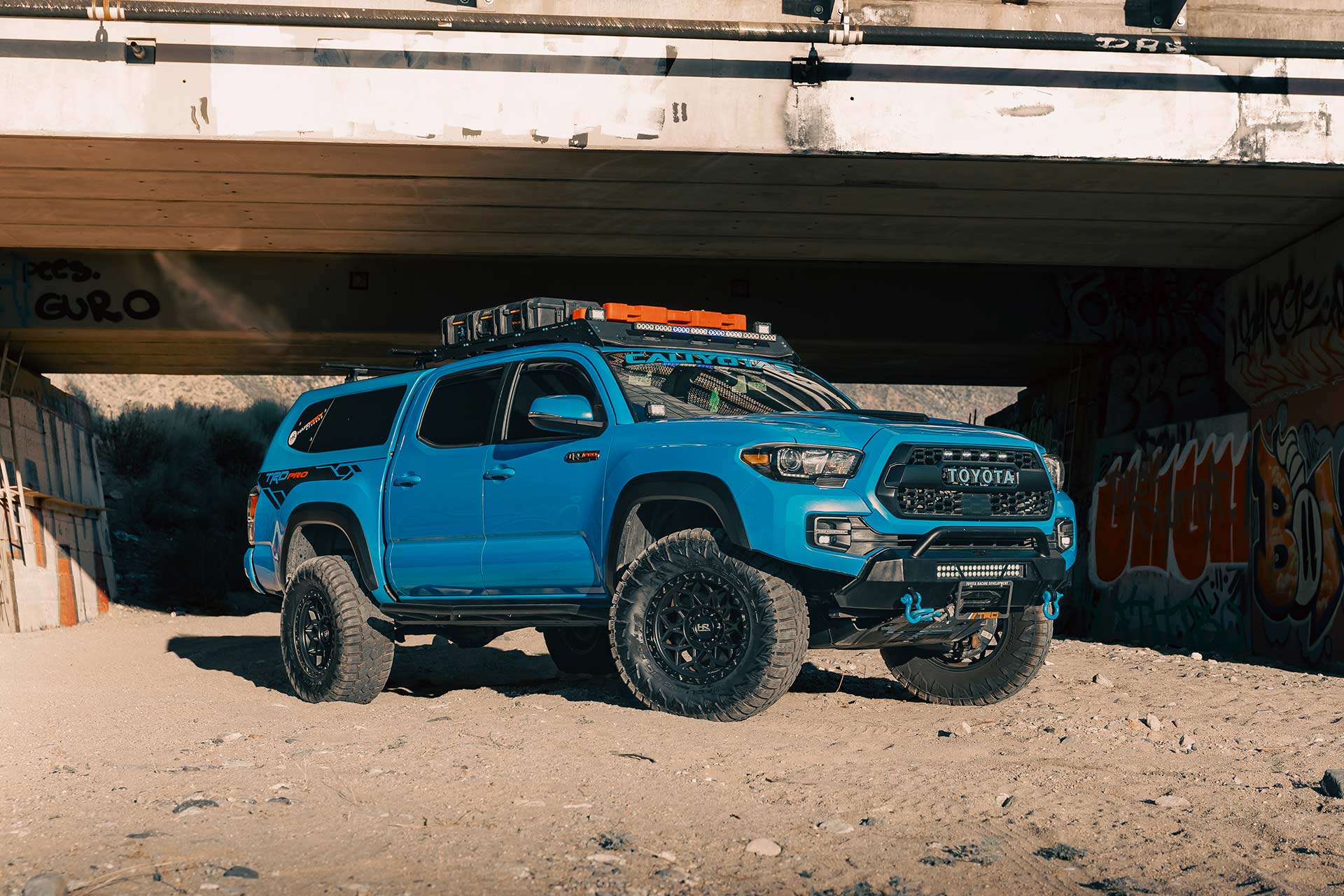 voodoo blue toyota tacoma with matte black hardrock h108 off road wheels