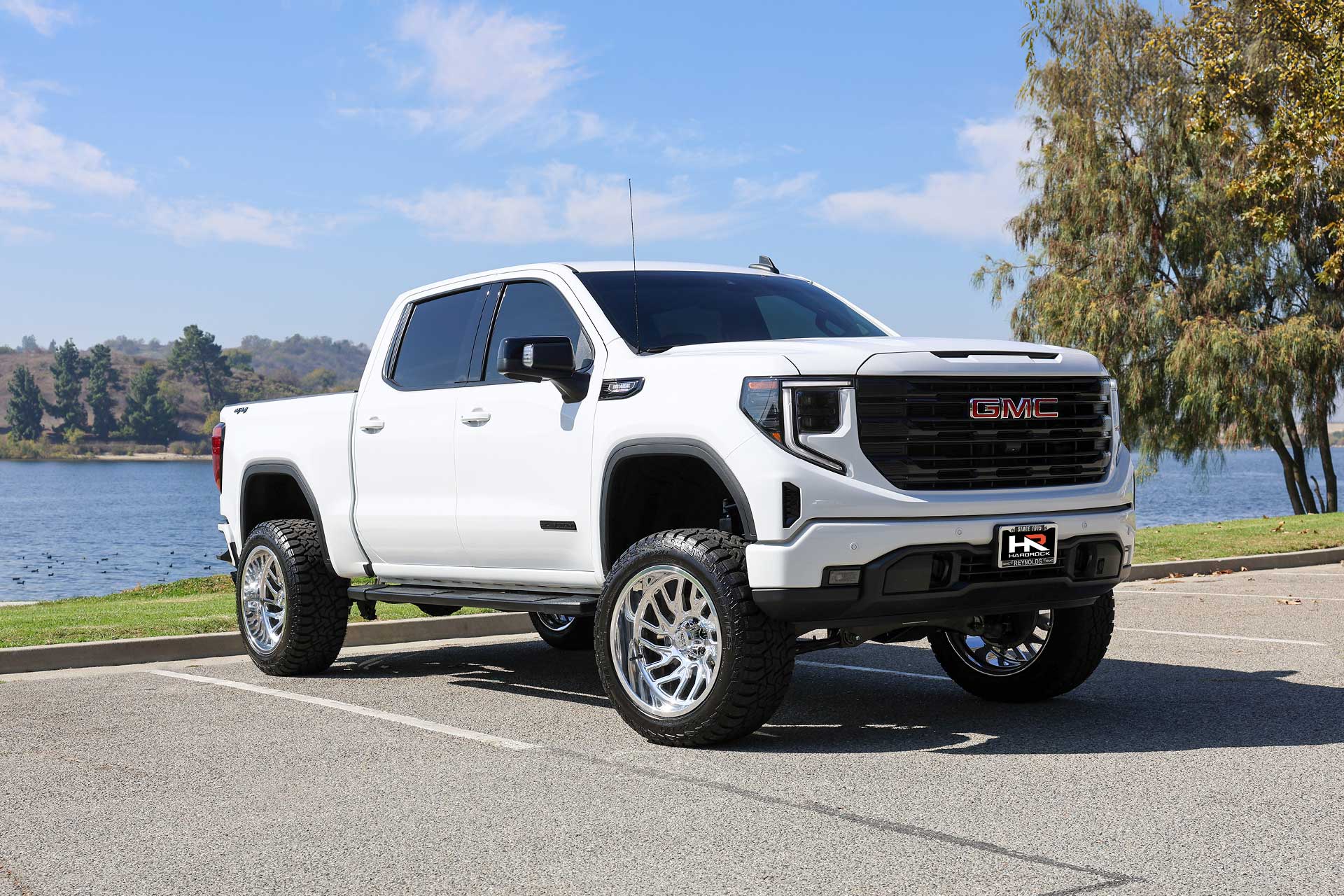 white gmc sierra 1500 with concave forged hardrock offroad h912 truck wheels