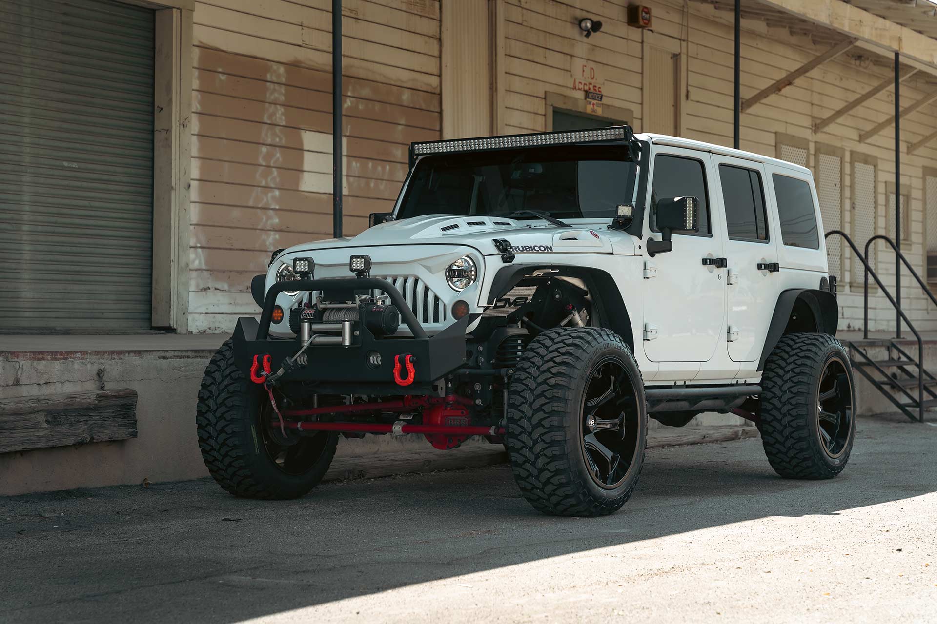 white jeep wrangler jk rubicon with gloss black hardrock h505 off road wheels